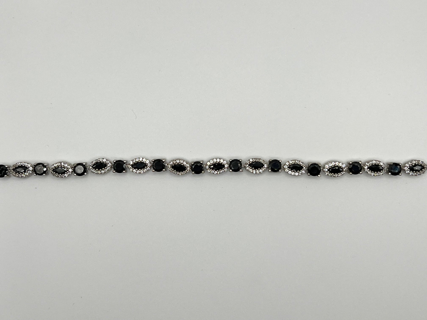 Sterling silver tennis bracelet with black and white crystals