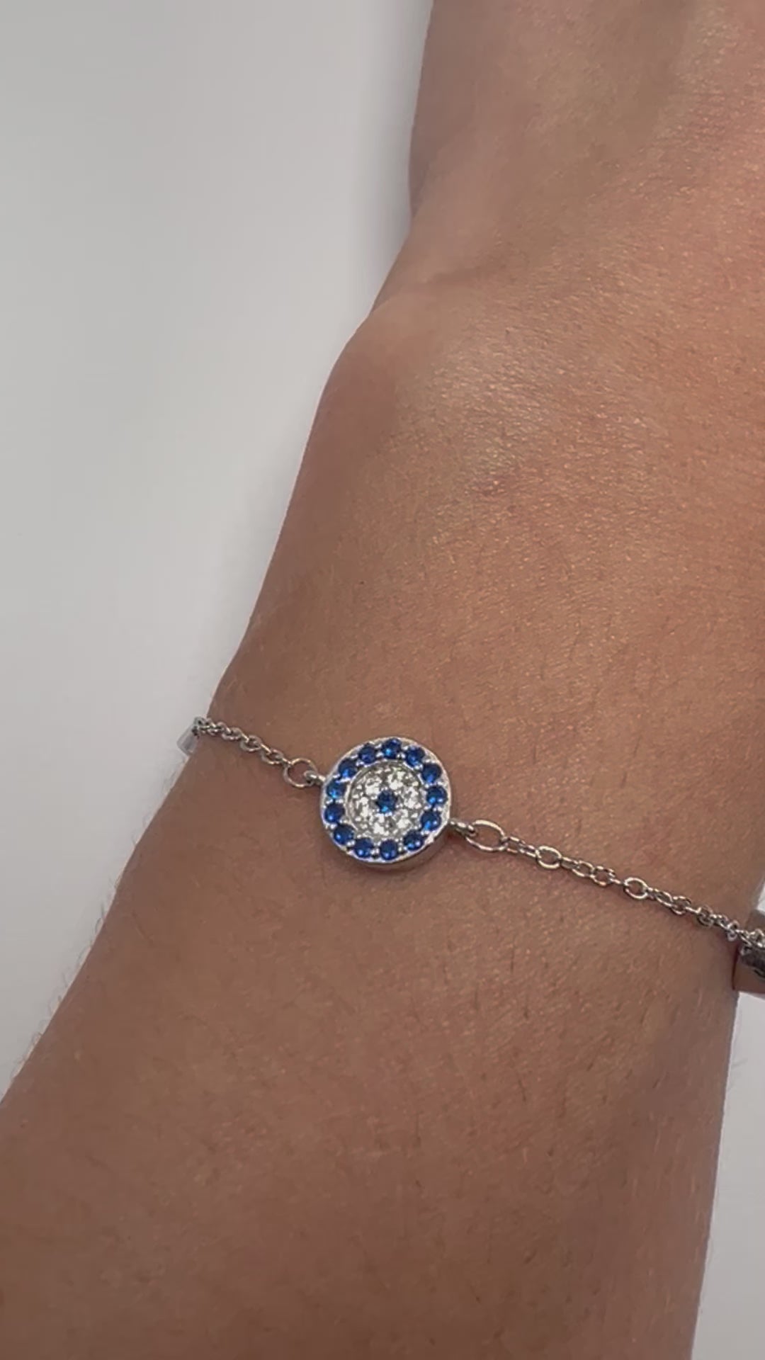 Sterling silver tennis bracelet with white and blue crystals