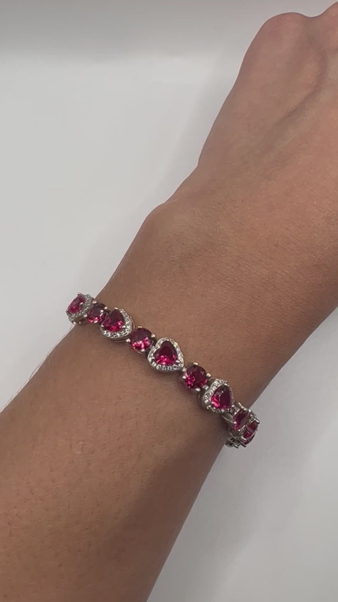 Sterling silver tennis bracelet with pink crystals