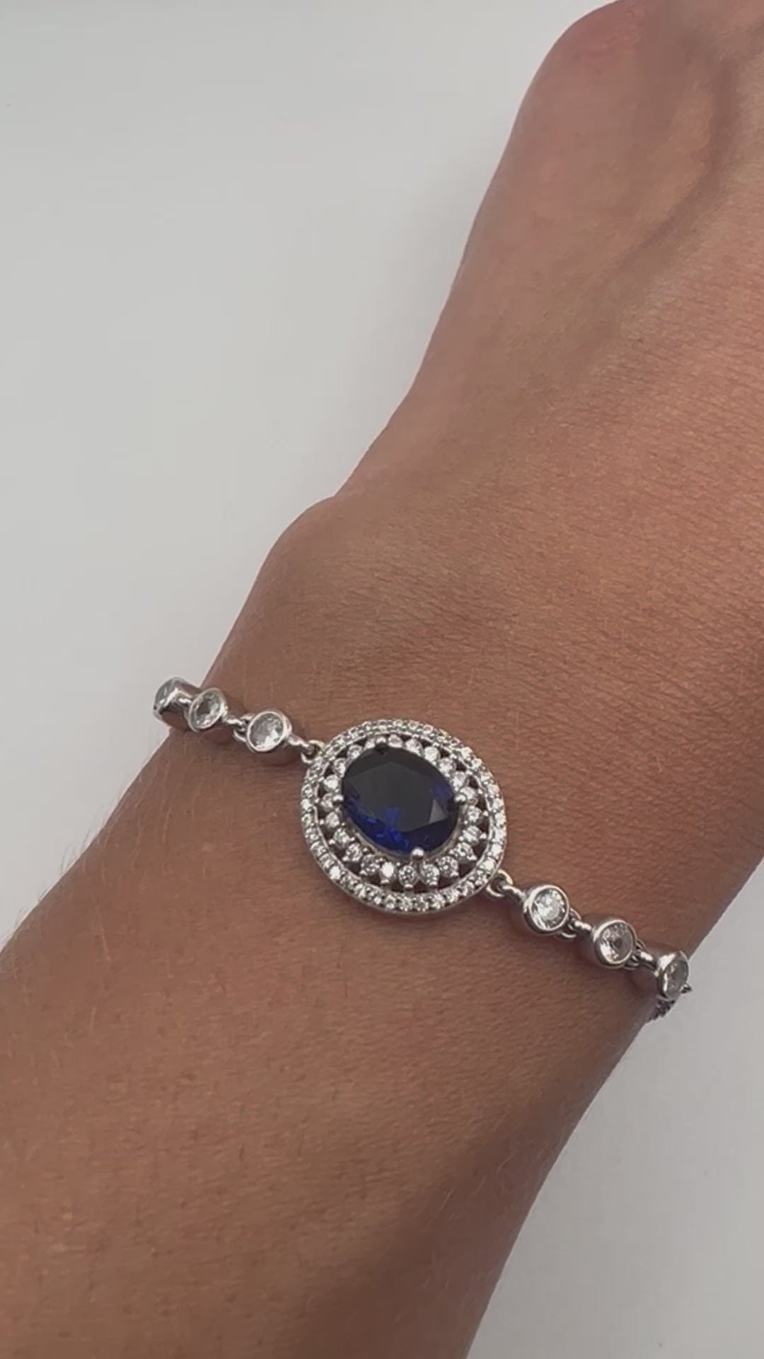 Sterling silver chain bracelet with blue and white crystals