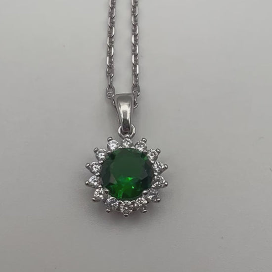 Sterling silver necklace with green crystal pendant