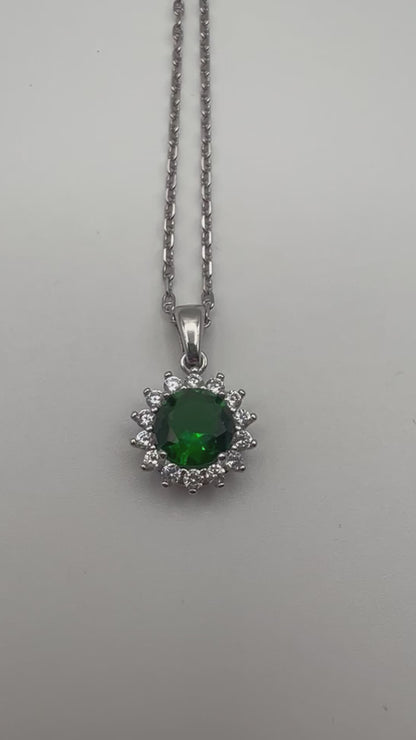 Sterling silver necklace with green crystal pendant