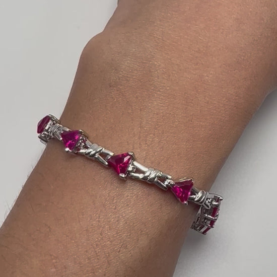 Sterling silver tennis bracelet with pink crystals